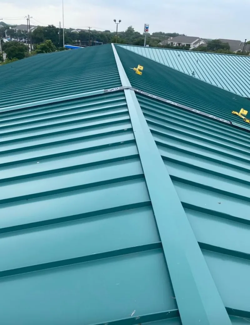 Green commercial metal roof ridge and valley for Metal Roof Repair in Sheridan